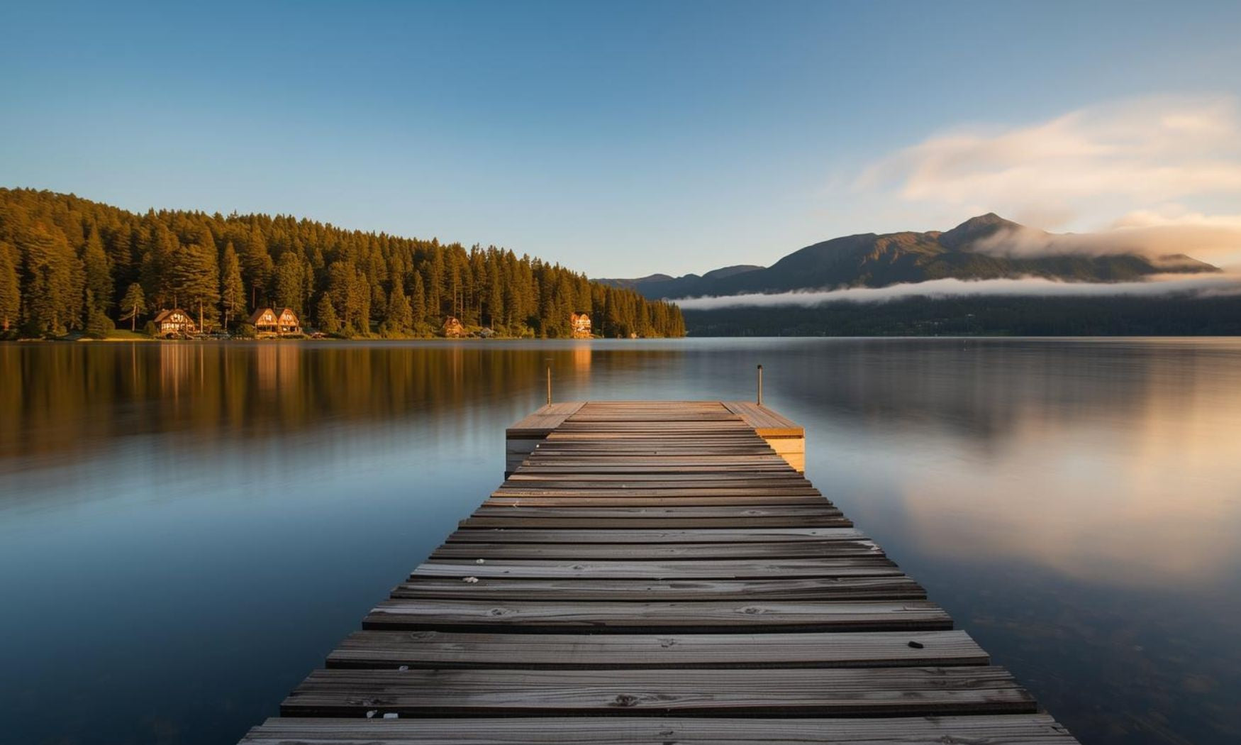 “Dock extending toward the water symbolizing an outdoor and lifestyle-inspired collection”