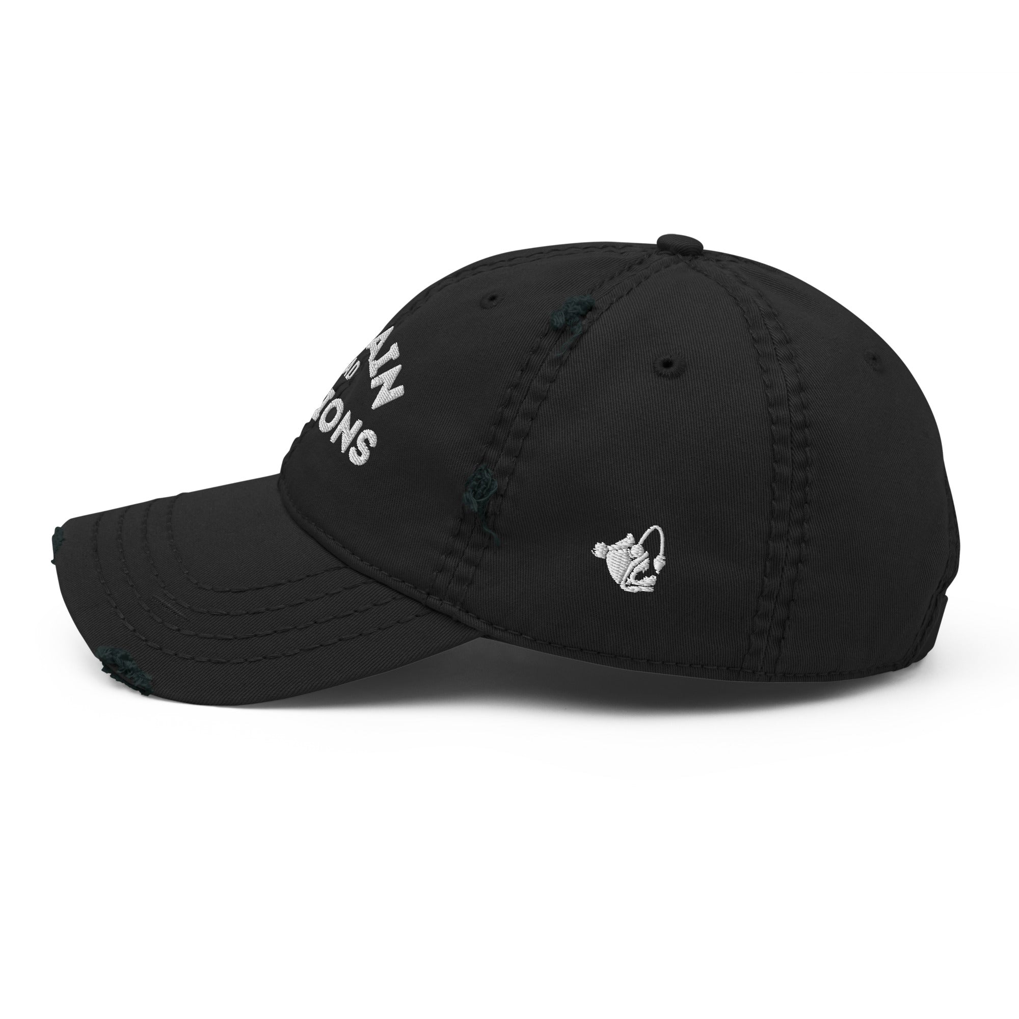 Side view of the black distressed dad hat with the embroidered white “Captain of Bad Decisions” design, highlighting the worn-in texture and stitching.