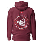 Back of the maroon premium hoodie showing a printed circular The Naughty Angler logo in red and white with a printed Canadian flag above it.