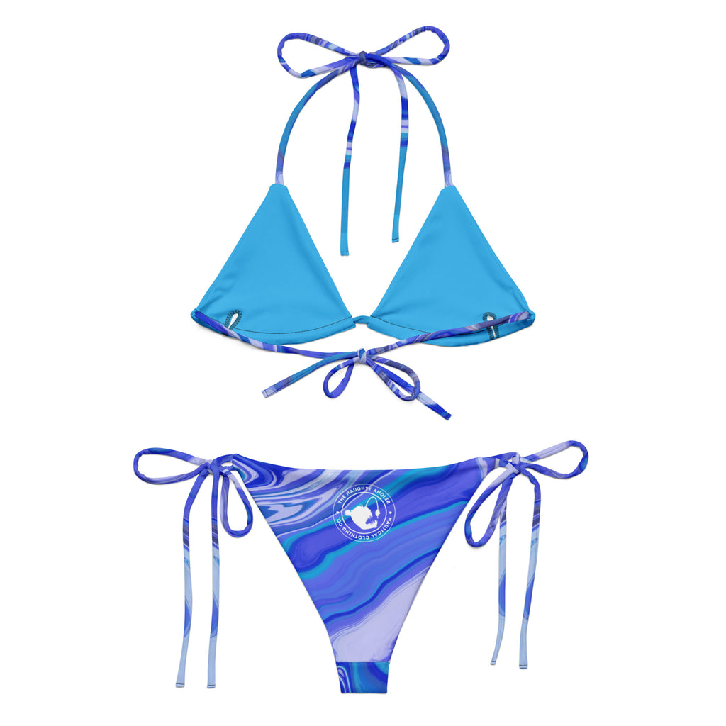 Back view of women’s ocean print recycled string bikini bottoms with fluid art design and white circular The Naughty Angler™ logo