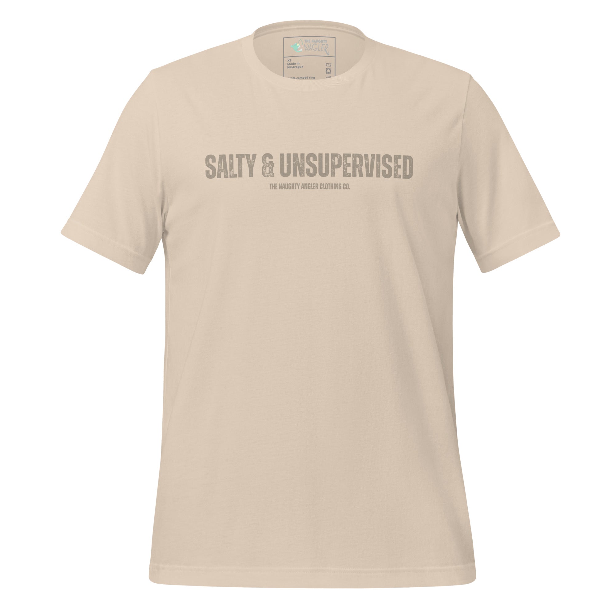 Front view of unisex soft cream T-shirt with tan wording reading “Salty & Unsupervised” by The Naughty Angler™
