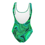 Back view of women’s sea green one-piece swimsuit featuring green fluid art design, no logo
