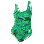 Front view of women’s sea green one-piece swimsuit with green fluid art design and white circular The Naughty Angler™ logo
