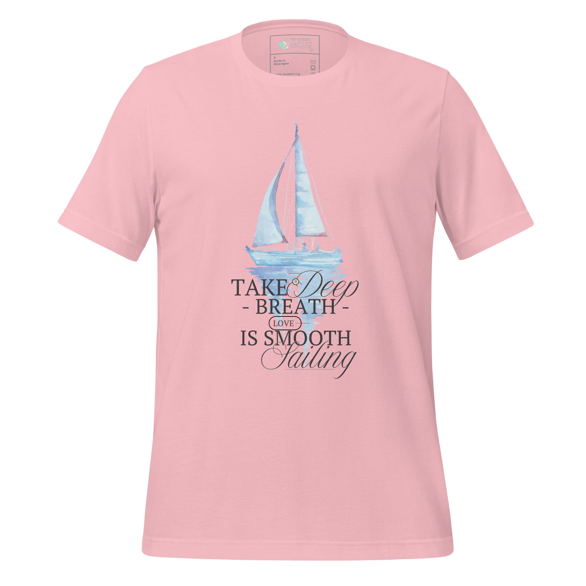 Front view of unisex pink T-shirt with elegant wording “Take a Deep Breath Love Is Smooth Sailing” and a pastel sailboat illustration by The Naughty Angler™
