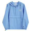 Front view of light blue Champion packable jacket with small embroidered The Naughty Angler™ logo on the upper right chest
